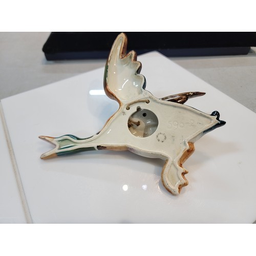 222 - Beswick wall hanging flying mallard, stamped 596-2, with a good glaze with no chips or cracks, heigh... 