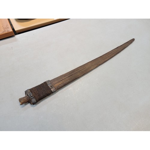 223 - An impressive antique sword fish bill blade, with a antique hammered metal collar and string made ha... 