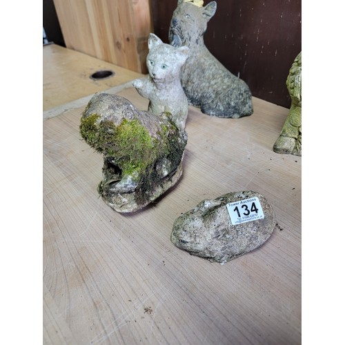 134 - Collection of concrete garden figures inc a hatching duck, gnome, dog, cat, sitting fawn, hare etc, ... 