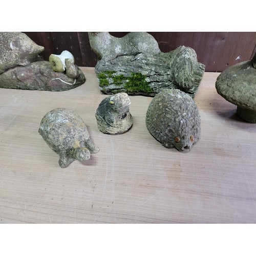 134A - Quantity of 8x concrete garden ornaments inc a mole, hedgehog, frog on a pad, tortoise etc tallest p... 