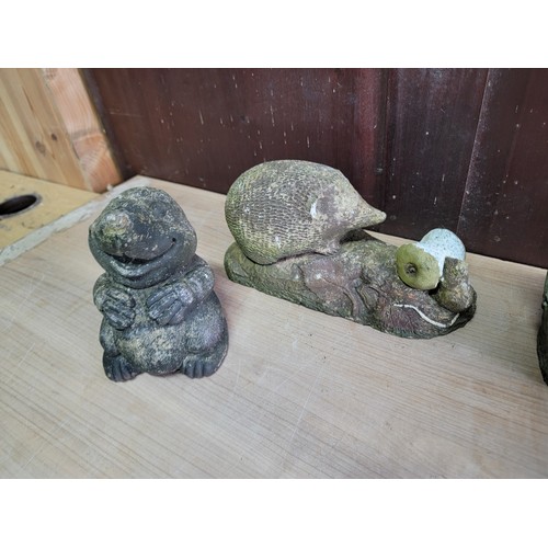 134A - Quantity of 8x concrete garden ornaments inc a mole, hedgehog, frog on a pad, tortoise etc tallest p... 