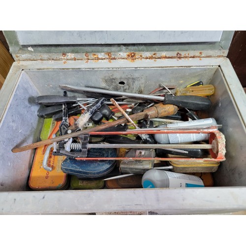 135 - 2x tool boxes full of a selection of tools inc hammers, belly drill, pliers, screwdrivers, a job lot... 