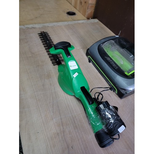 137 - Green verigreen hedge trimmer with battery along with a G-tech air ram vacuum cleaner with power cab... 