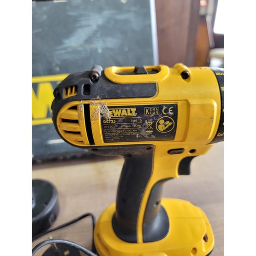 153 - 2x cased DeWalt cordless hammer drills with 2x spare batteries and 1x charge that fits both along wi... 