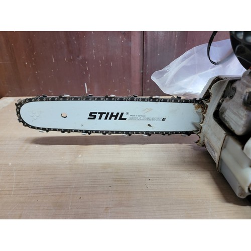 143 - A Stihl M51/81/C chainsaw, complete with manual and spark plug key tool, in working order, will need... 