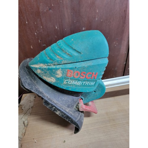 158 - Electric Bosch ART26 Combitrim with telescopic handle complete with power cable and quantity of spar... 