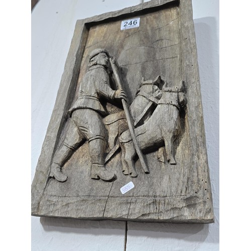 246 - An antique very old hand carved wooden panel Frieze, depicting an agricultural scene of a man leadin... 