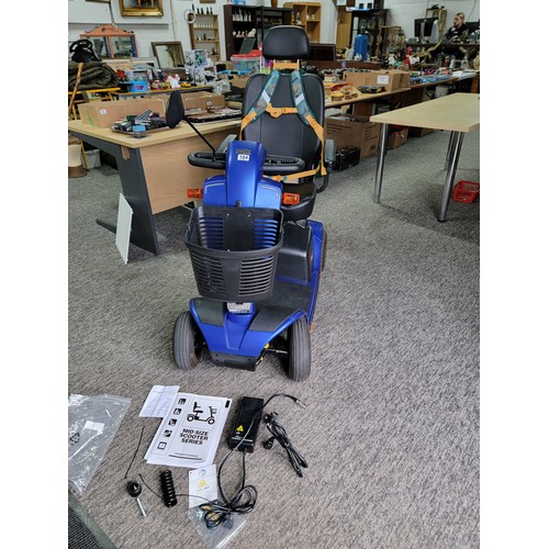 184 - Pride Colt Deluxe 2.0 mid size mobility scooter in excellent condition with adjustable seat, shoppin... 