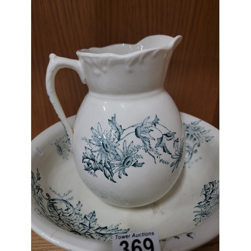 369 - Vintage jug and bowl set along with a addition of a vase, all have a matching pale coloured blue flo... 