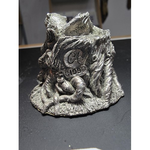 338 - A hallmarked silver badger figure coming out of a tree stump by Country Artists, also signed to the ... 