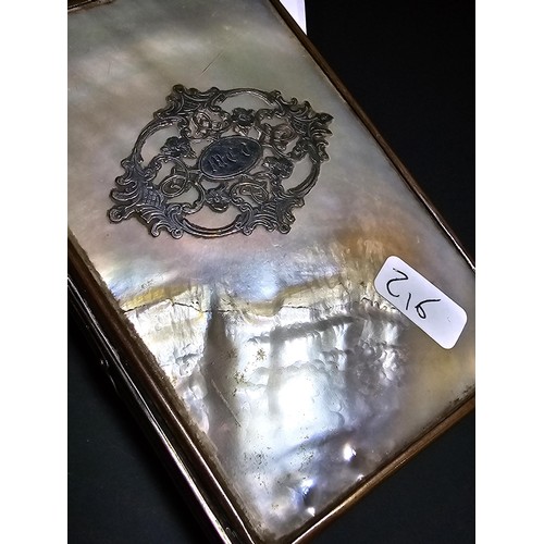 341 - A good quality antique mother of pearl cased notebook having an overlaid sterling silver cartouche t... 