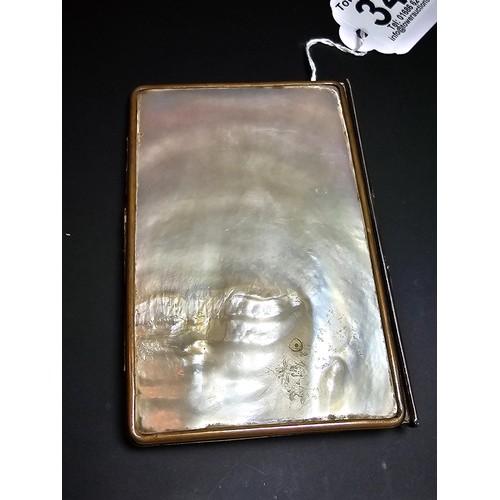 341 - A good quality antique mother of pearl cased notebook having an overlaid sterling silver cartouche t... 