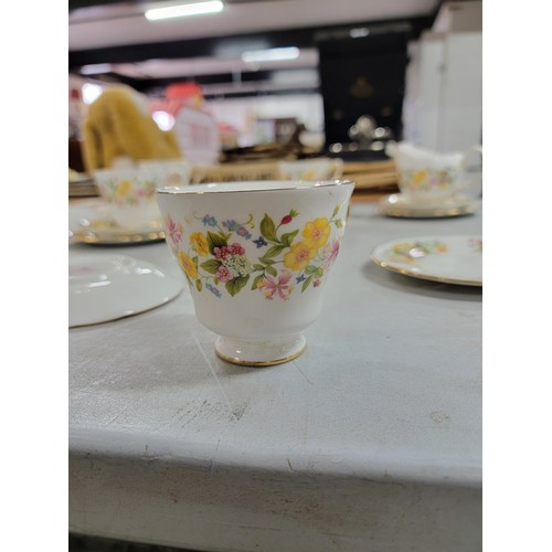 378 - An 18 piece Colclough partial tea set with a floral design consisting of 4x trios, 2x saucers and pl... 