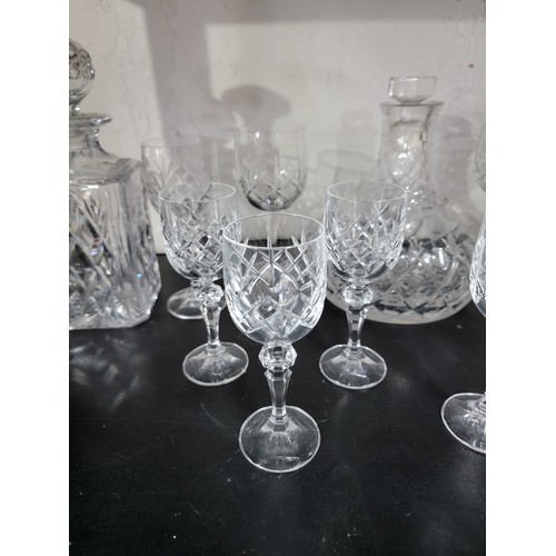 380 - Quantity of glassware to inc 2x glass crystal square decanters with stoppers along with a port decan... 