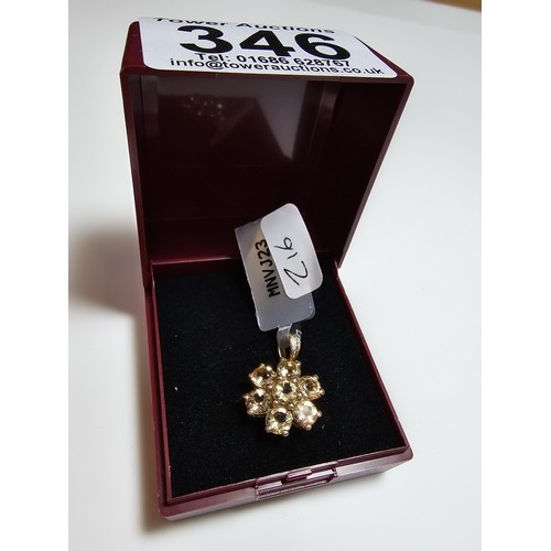 346 - A brand new with tags 10k yellow gold pendant inset with 7 natural citrine faceted gemstones n the f... 