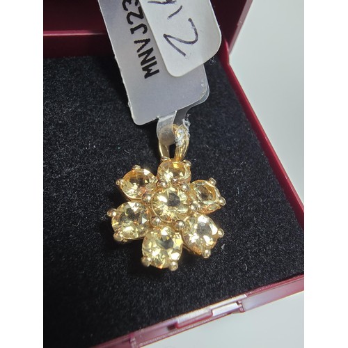 346 - A brand new with tags 10k yellow gold pendant inset with 7 natural citrine faceted gemstones n the f... 