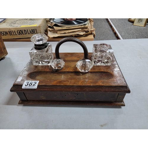 382 - Vintage wooden desk tidy with metal handle with 2x cut glass ink pots one with lid one with no stopp... 