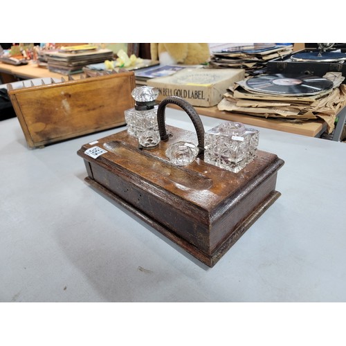 382 - Vintage wooden desk tidy with metal handle with 2x cut glass ink pots one with lid one with no stopp... 