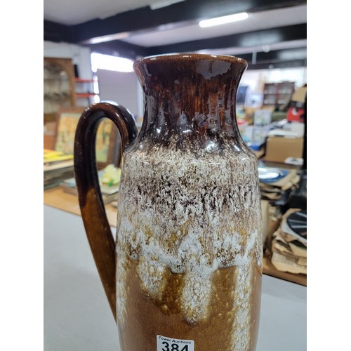 384 - Large West German brown lava glazed pitcher of large proportions in good condition with no chips or ... 