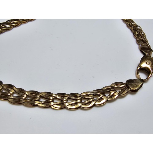 357 - A good hallmarked 9ct yellow gold double link bracelet signed Unoaerre in excellent clean condition,... 