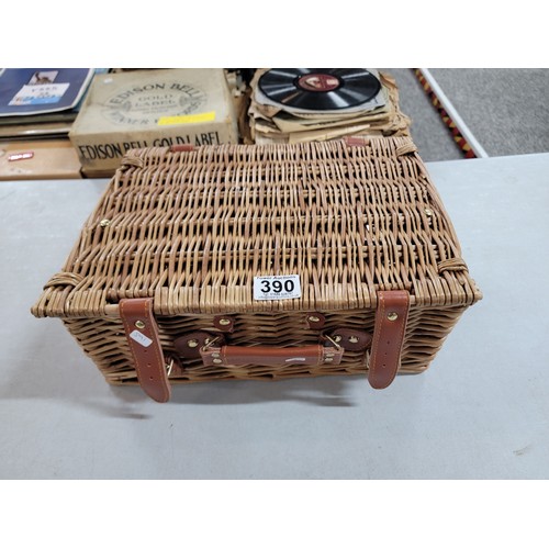 390 - Wicker basket containing a large quantity of Kings pattern cutlery for 12 persons inc knives, forks,... 