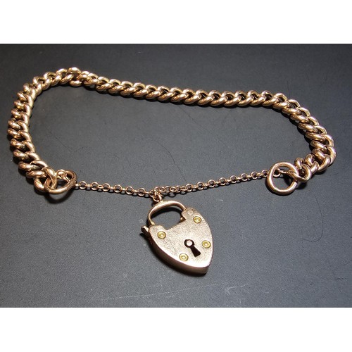 358 - A stunning 9ct rose gold curb link bracelet with a chunky 9ct rose gold padlock, in excellent clean ... 