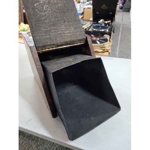 391 - Antique oak coal box with metal lining in good overall condition with carved flower to the front and... 