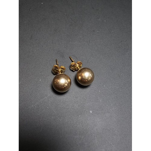 361 - A pair of 9ct yellow gold stud ball earrings in good clean condition, boxed. Total weight of 0.45g.