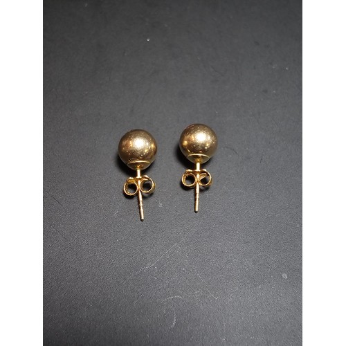 361 - A pair of 9ct yellow gold stud ball earrings in good clean condition, boxed. Total weight of 0.45g.