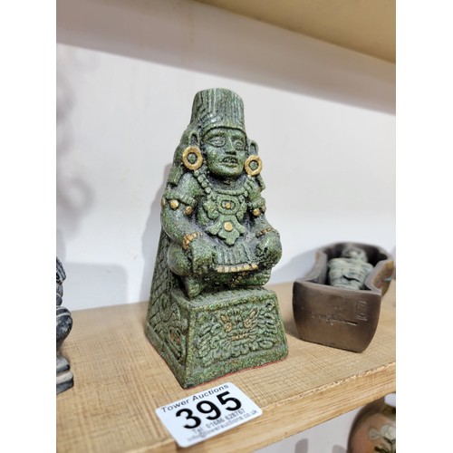 395 - Quantity of resin figurines to inc a small red Buddha, a kneeling Chinese army figure, an Aztec Maya... 