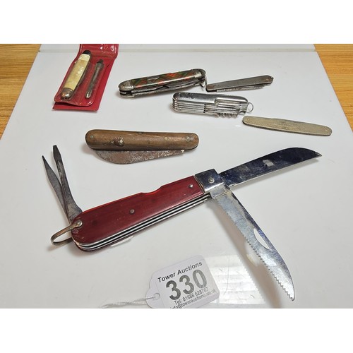 330 - A collection of 7x vintage penknives which includes an oversized penknife, a vintage Richards penkni... 