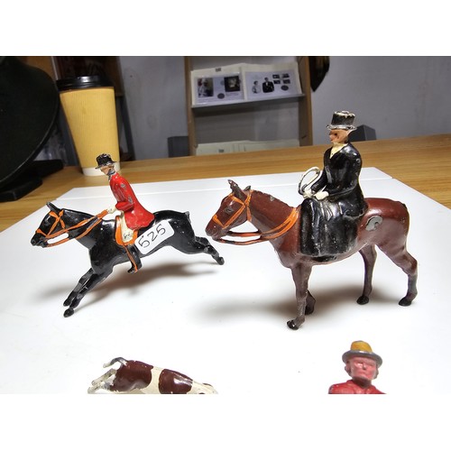 336 - A quantity of 5 vintage metal Britain's figures to include a lady and gent on horseback, 2 figures a... 