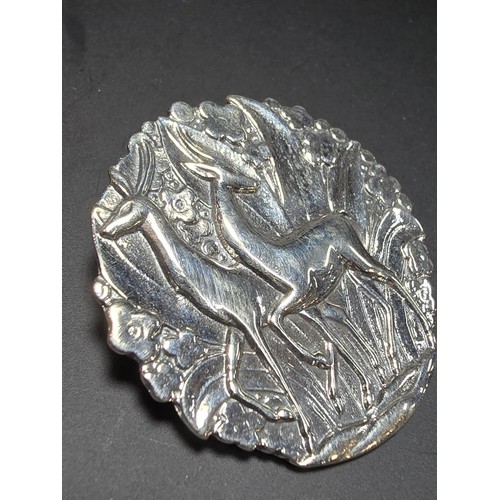 271 - A good quality vintage Danish sterling silver brooch with an art Nouveau design with a scene featuri... 