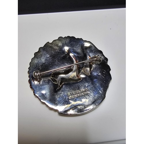 271 - A good quality vintage Danish sterling silver brooch with an art Nouveau design with a scene featuri... 