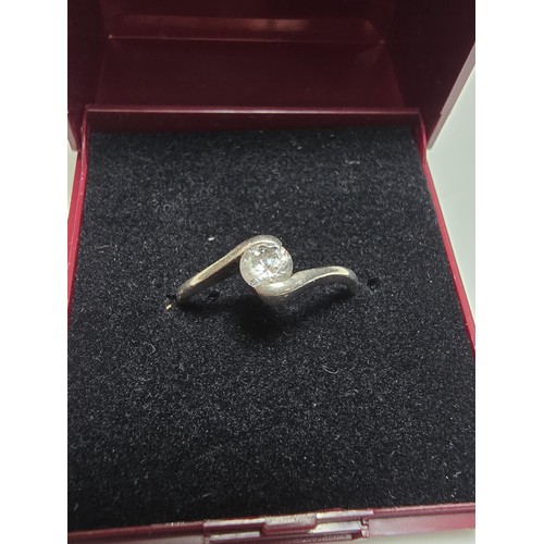 279 - A 925 silver solitaire ring inset with a sparkly crystal CZ stone, in good clean condition, boxed, s... 