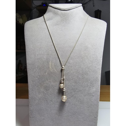 281 - A 925 silver long drop necklace, 22