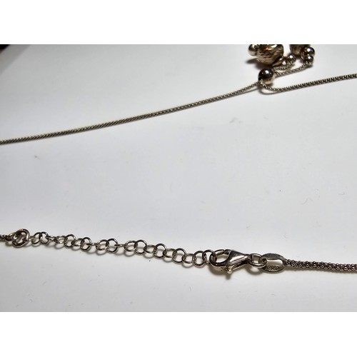 281 - A 925 silver long drop necklace, 22