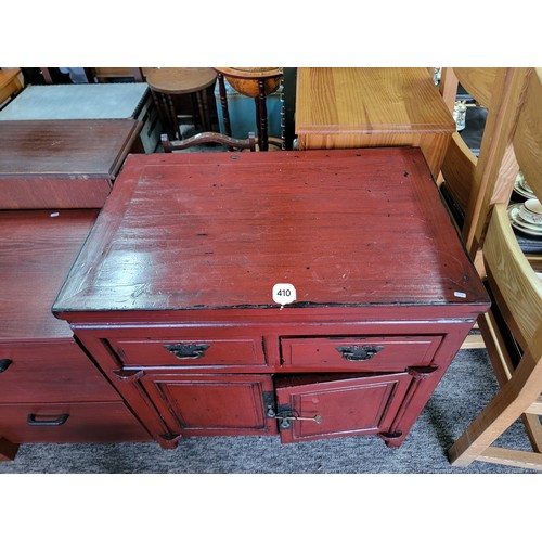 410 - Two drawer over two door mahogany painted wooden cupboard with locking pin to the bottom drawers mea... 