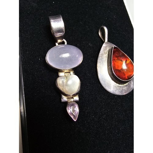 288 - 2x good quality unused 925 silver gemstone pendants, 1 is inset with a chalcedony pearl and amethyst... 