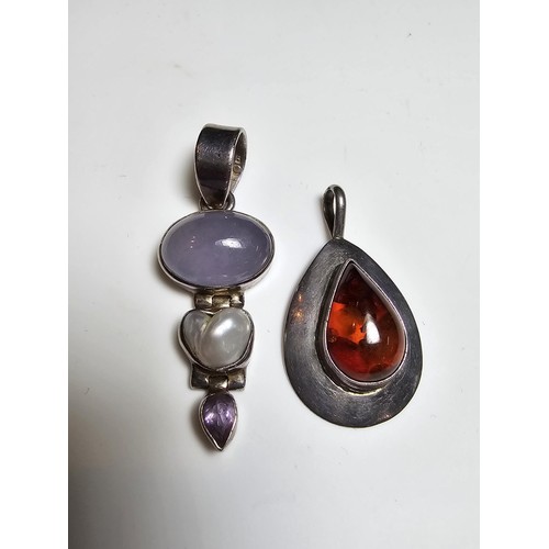 288 - 2x good quality unused 925 silver gemstone pendants, 1 is inset with a chalcedony pearl and amethyst... 