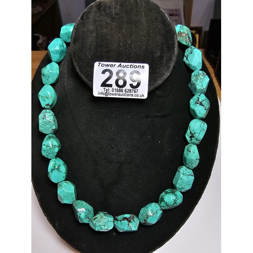 289 - An impressive turquoise necklace featuring large faceted natural turquoise beads. Each bead presents... 