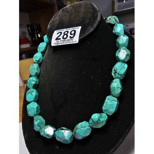 289 - An impressive turquoise necklace featuring large faceted natural turquoise beads. Each bead presents... 