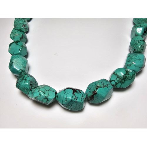 289 - An impressive turquoise necklace featuring large faceted natural turquoise beads. Each bead presents... 