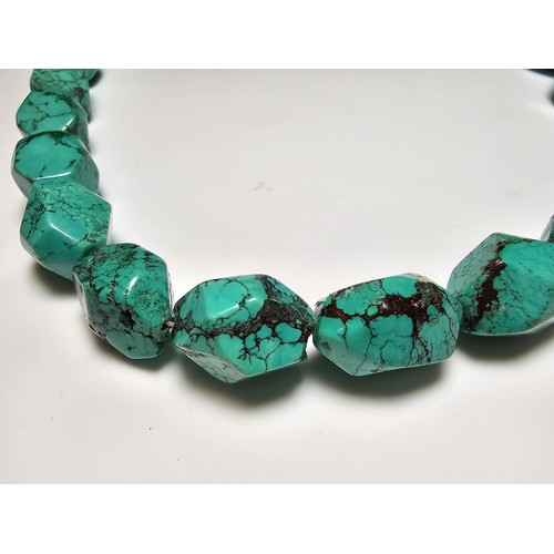 289 - An impressive turquoise necklace featuring large faceted natural turquoise beads. Each bead presents... 