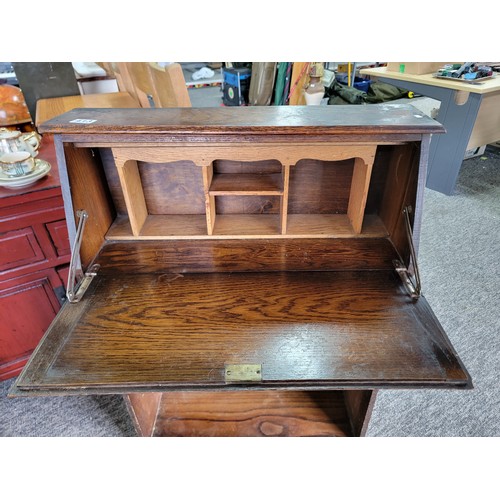 413 - Vintage oak book case with bureau top with drop down leaf to reveal a divisional storage area, book ... 