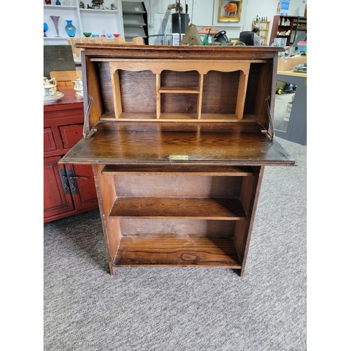 413 - Vintage oak book case with bureau top with drop down leaf to reveal a divisional storage area, book ... 