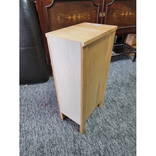 417 - Modern pine 4 drawer narrow storage cabinet in good overall condition measures 60cm high 20cm wide a... 