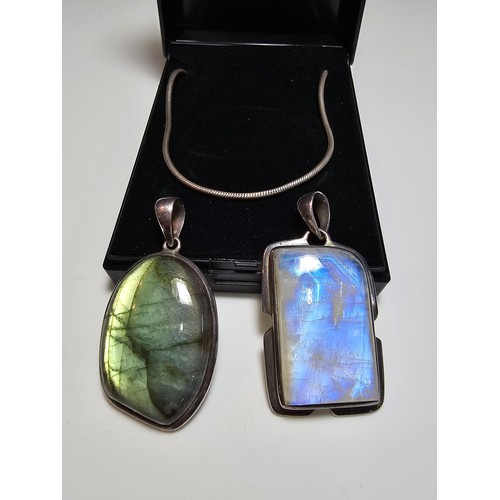 293 - 2x stunning 925 silver pendants, 1 inset with labradorite stone the other with a spectrolite stone (... 