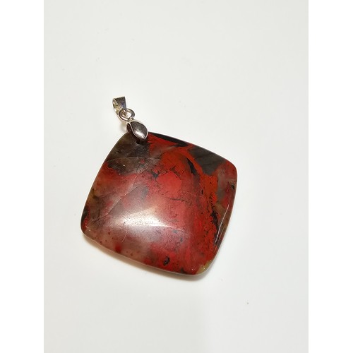 294 - 2 good quality 925 silver semi precious stone pendants to include a large oval tigers eye pendant an... 