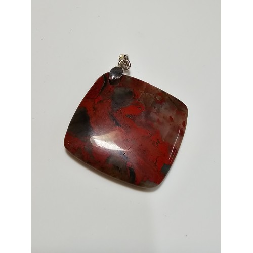 294 - 2 good quality 925 silver semi precious stone pendants to include a large oval tigers eye pendant an... 